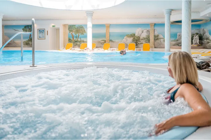 A woman sits in the bubbling whirlpool in the wellness area during a conference at the Arkona Strandhotel in Binz on the island of Rügen.